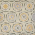 Close up image of pastel coloured cushion cover with kaleidoscope pattern