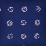 Close up of tie-dye inspired 45cm x 45cm cushion in navy blue cotton linen blend fabric
