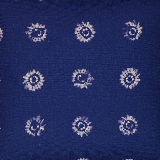 Close up of tie-dye inspired 45cm x 45cm cushion in navy blue cotton linen blend fabric