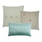 3 light coloured cushion set in varying textures