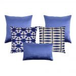 Photo of 5 tie-dye patterned cushion cover collection in blue and white colours