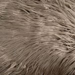 Neutral yet elegant rectangular fur cushion in light mink colour