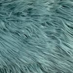Close up of sea green rectangular cushion cover