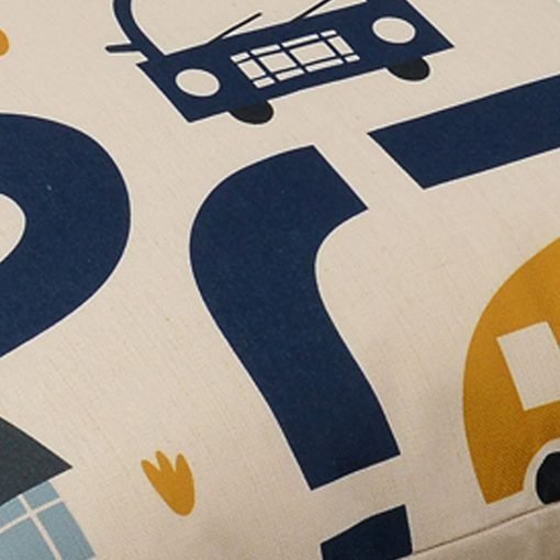 Close up image of colourful floor cushion with cars print