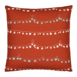Red Christmas cushion with strings of bells and baubles