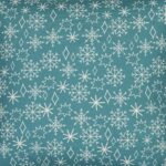 Close up photo of teal cushion cover with winter snowflakes