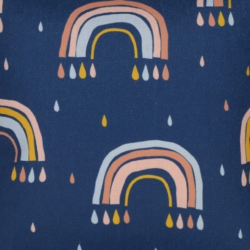 Close up photo of navy kids cushion with pink rainbows and raindrops