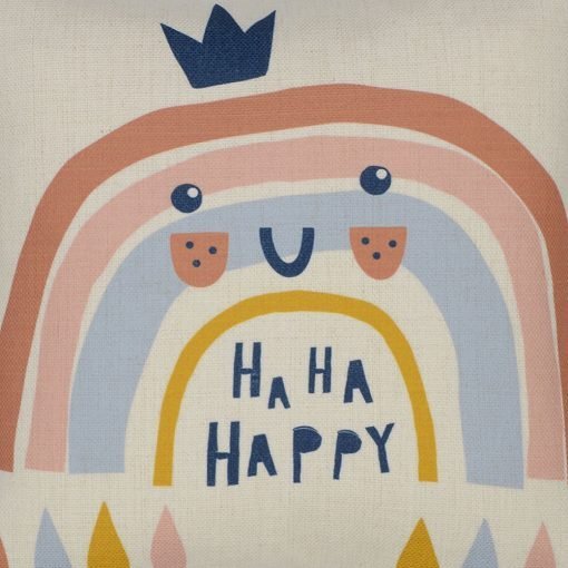 Close up of kids cushion cover with happy, pink rainbow