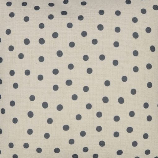 Close up image of kids cushion cover with plain polka dots
