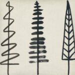 Close up photo of cotton linen blend cushion with minimalist trees design