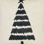Close up of cotton linen blend cushion cover with minimalist Christmas tree