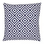 A striking geometric pattern is shown on a navy blue outdoor cushion cover.
