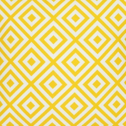A close up view of a striking geometric pattern is shown on a yellow outdoor cushion cover.