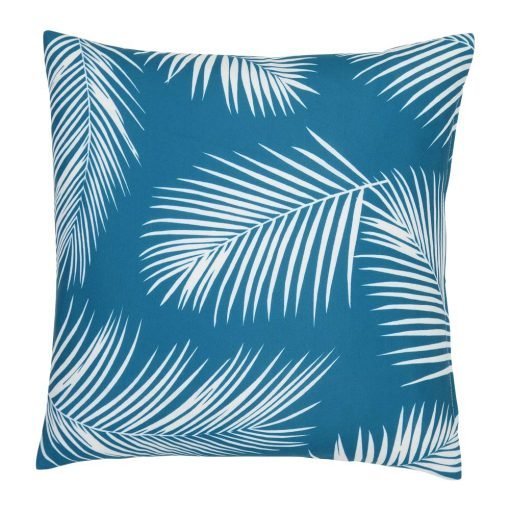 A repeating palm tree leaf print features on a waterproof teal outdoor cushion cover.