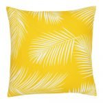 A repeating palm tree leaf print features on a waterproof yellow outdoor cushion cover.
