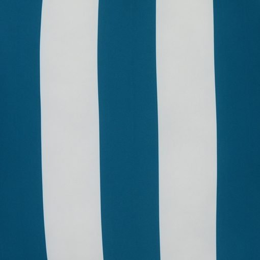 A close up view of a teal outdoor floor cushion is shown with stripes on one side and a solid colour on the other.