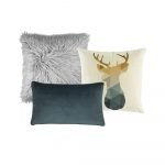 Photo of a set of 3 grey cushion covers with a scandi design.