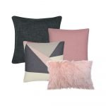 Photo of grey and pink cushion covers in abstract and block design