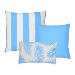A collection of three light blue outdoor cushion covers in striped, plain and botanical designs.