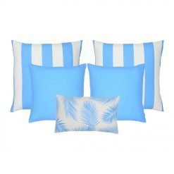 A collection of five light blue outdoor cushions featuring striped, plain and botanical designs.