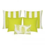 A collection of five lime green outdoor cushions featuring striped, plain and botanical designs.