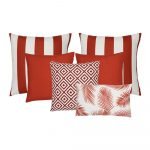 A collection of six red coloured outdoor cushions featuring striped, plain, geometric and botanical designs.
