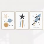 Set of three fun kids A2 wall prints with moon, stars and rocket designs.