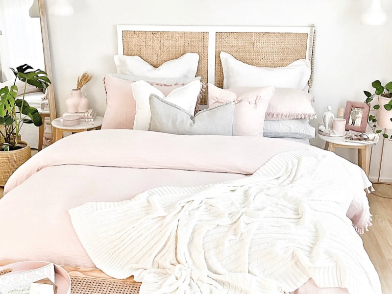 Pink themed bedroom with white accent pieces