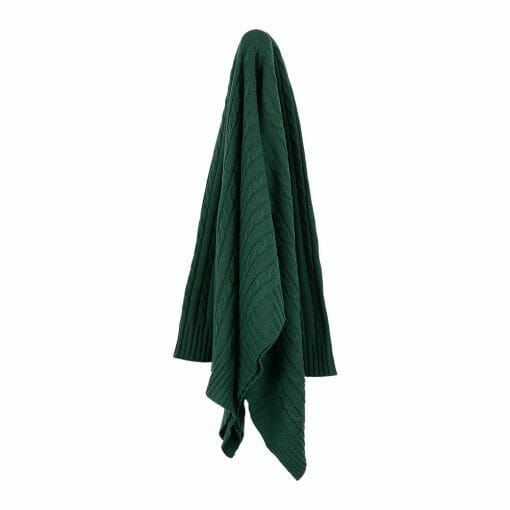 An image of a knitted throw blanket in emerald green colour