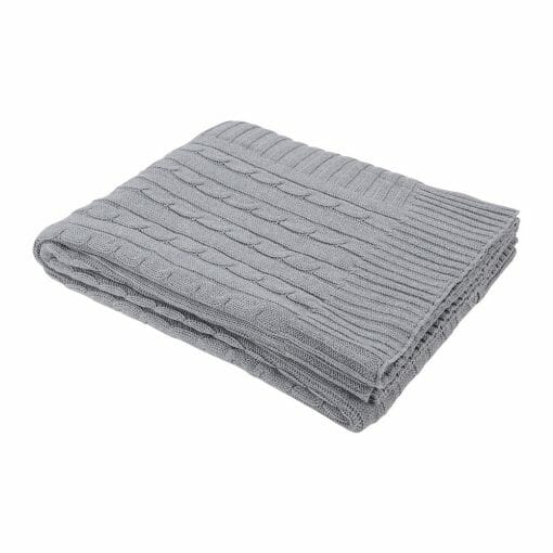 An image of a light grey knitted throw blanket