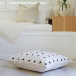 Floor cushion cover with cross print in black and white colour