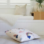 Colourful floor cushion cover with rainbow print