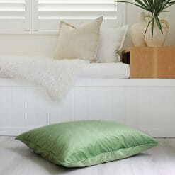 Green-coloured velvet floor cushion level