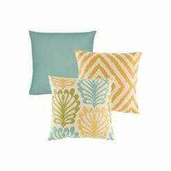 Beach inspired cushion covers in teal, yellow and shell design.