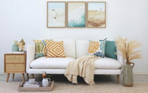 Yellow and teal Juno cushion range styled in a coastal themed room