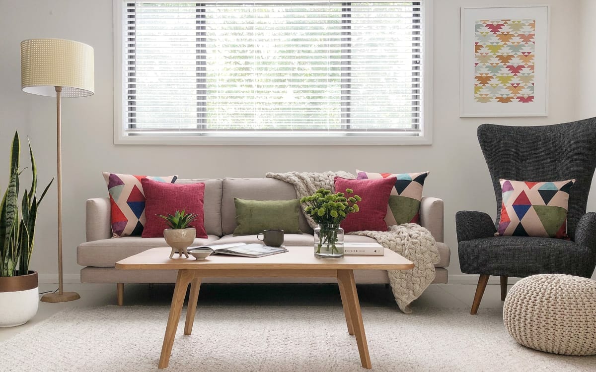 Phoenix cushion range in a mid-century modern themed room