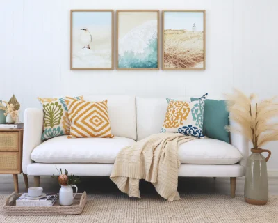 A room decorated in a Coastal theme with matching designs and prints.