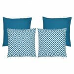 A collection of four teal coloured outdoor cushions featuring two geometric design cushions and two plain cushions.