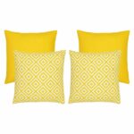 A collection of four yellow outdoor cushions featuring two geometric design cushions and two plain cushions