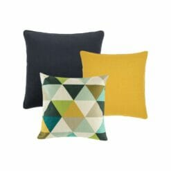 A collection of 3 cushions featuring a plain black and a plain gold cushion and a geometric design cushion cover