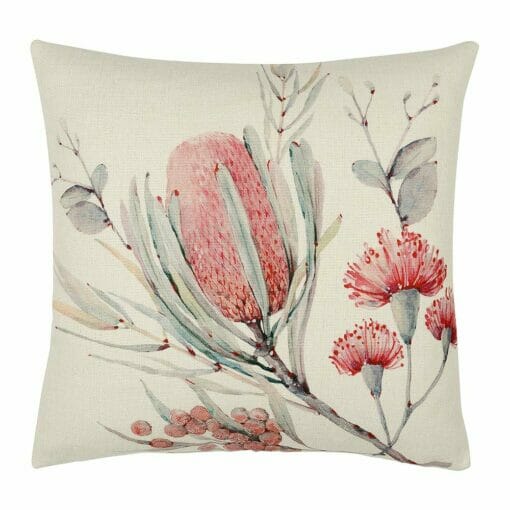 Close up image of floral themed cushion cover with pink posy print