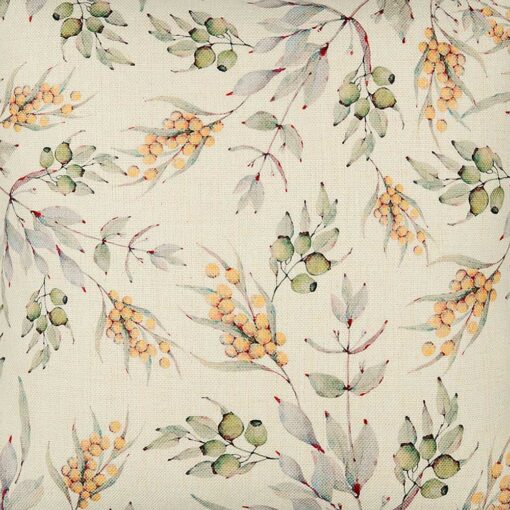 Close up image of off-white cushion with wattle shrub design