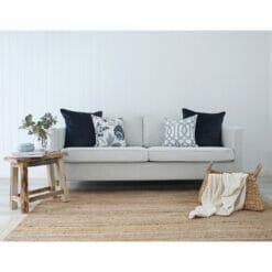 Minimalist yet elegant living room with Hamptons blue floral and trellis print cushions