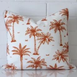 Lovely terracotta palm tree cushion made from outdoor fabric and in an elegant square size.