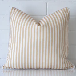 Vibrant striped outdoor cushion cover in a stylish square size with beige colouring.