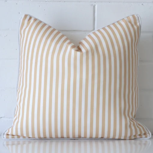 Vibrant striped outdoor cushion cover in a stylish square size with beige colouring.