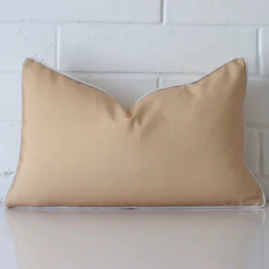 A gorgeous outdoor rectangle cushion in beige.