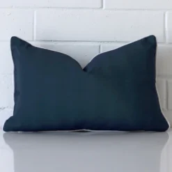 A premium outdoor navy blue cushion in a rectangle size.