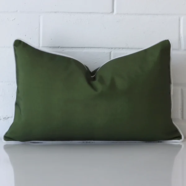 .Gorgeous rectangle outdoor cushion cover that has an olive green hue.