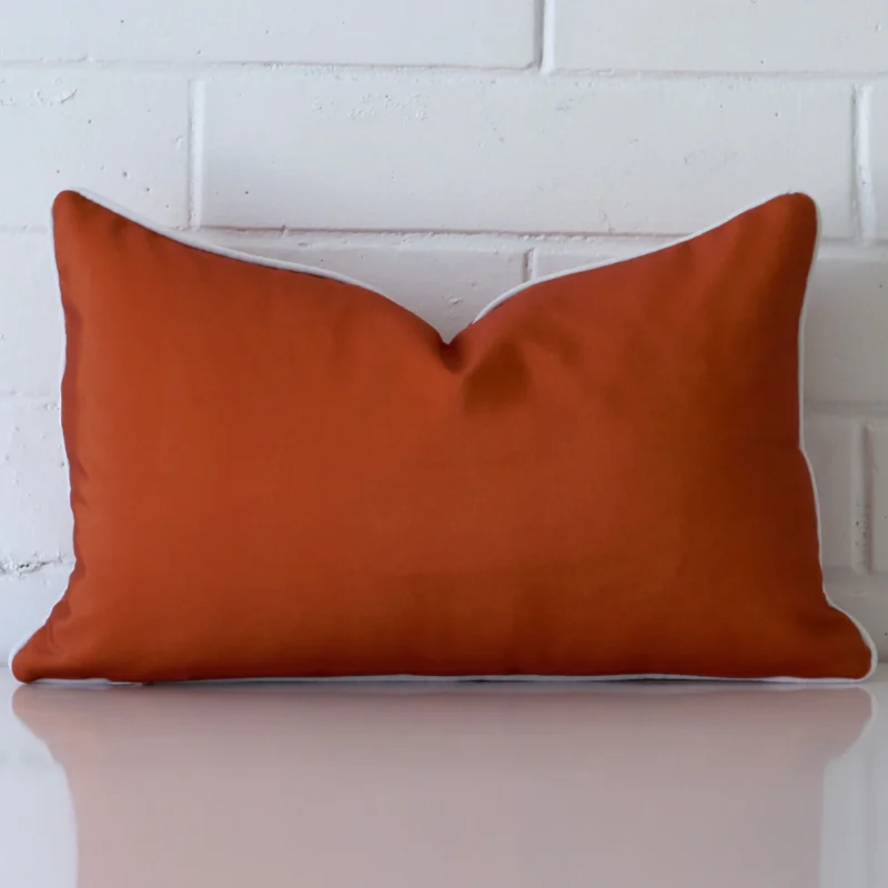 Airlie Waterproof Terracotta Outdoor Cushion Cover - Rectangle - SC906-30 Front view of terracotta cushion. Crafted from a special outdoor material.